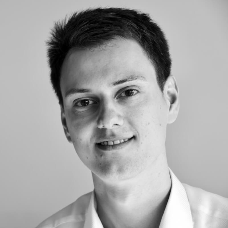 Face of a young man in black and white
